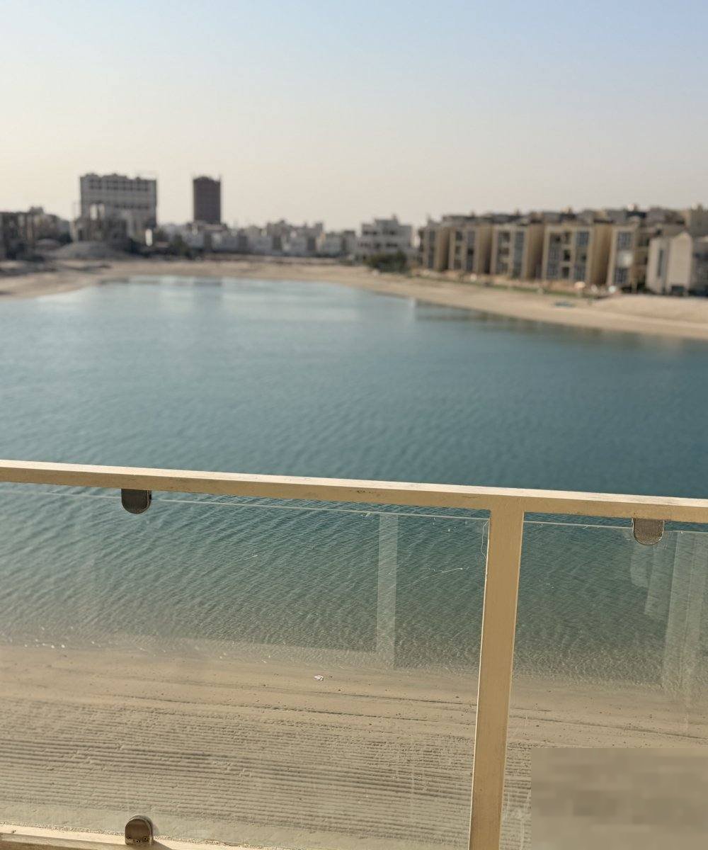 Two-room apartment with a hall, sea view, and a shared swimming pool.